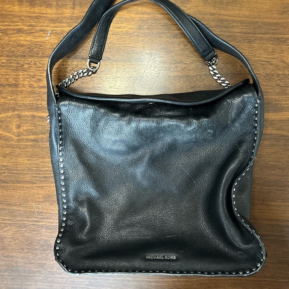 This is a Michael Kors bag black. Very good condition. - Picture 2 of 6